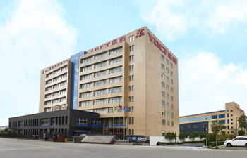 Vista frontal de la fábrica de YDCT que muestra las instalaciones de producción de tubos flexibles de escape y fuelles de acero inoxidable.